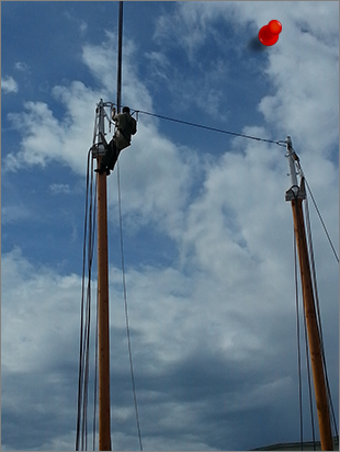 Stepping the new mast on Seattle historic schooner Lavengro